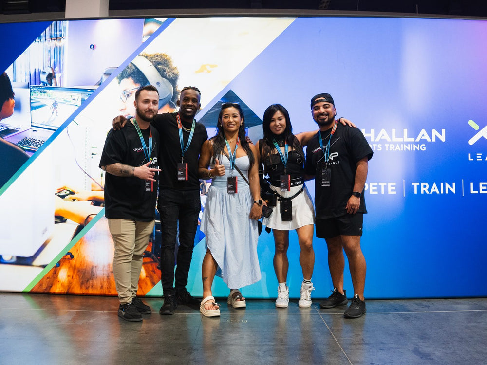 Zeda Zhang and Lei Ying Lee with the Vegas Inferno crew